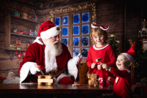 Children visiting Santa's Workshop in Chattanooga, Tennessee Interactive Santa Photos